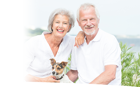 elderly couple with dog